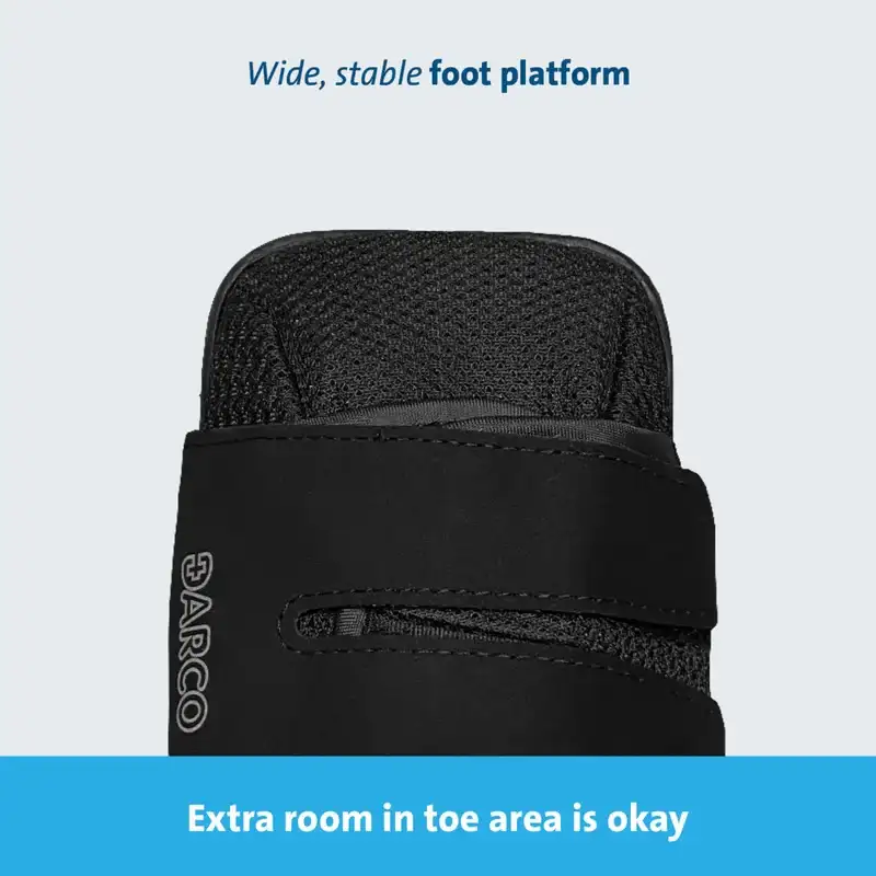The boot from above, showing the wide, stable foot platform and the room left at the toe