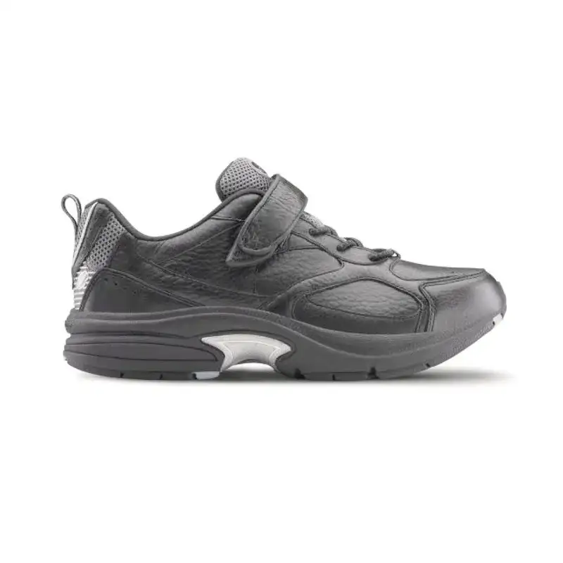 The Dr. Comfort Spirit in black, three-quarter view showing the strap and the cushioned sole