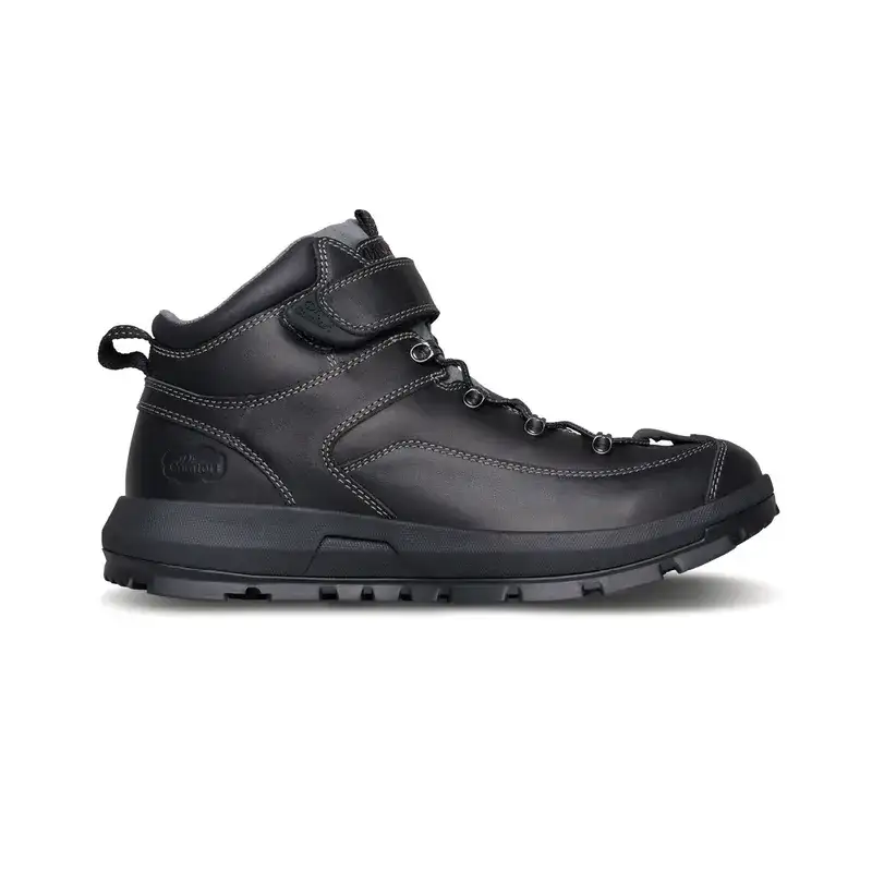 The Dr. Comfort Yukon in black, outside profile showing the height of the ankle and the lugged sole