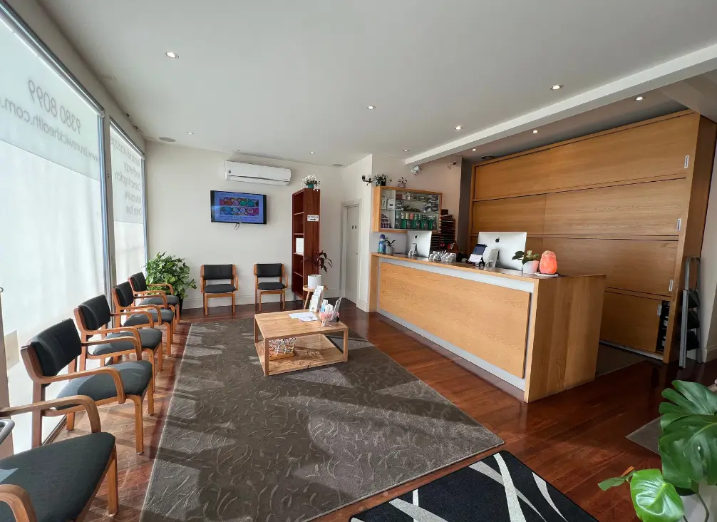 Welcoming podiatry reception area in Brunswick clinic with modern design
