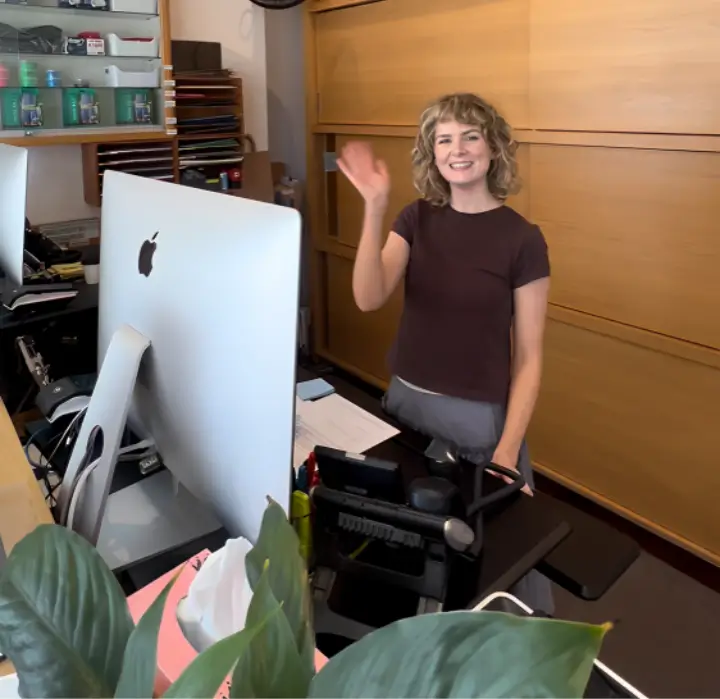 Podiatry clinic receptionist welcoming patients at front desk in Brunswick