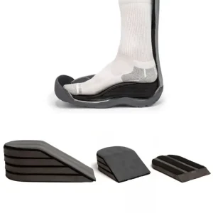 Achilles wedge inserts used in CAM boot for podiatry treatment of tendon injuries