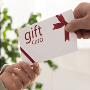 Podiatry gift card being handed from one person to another