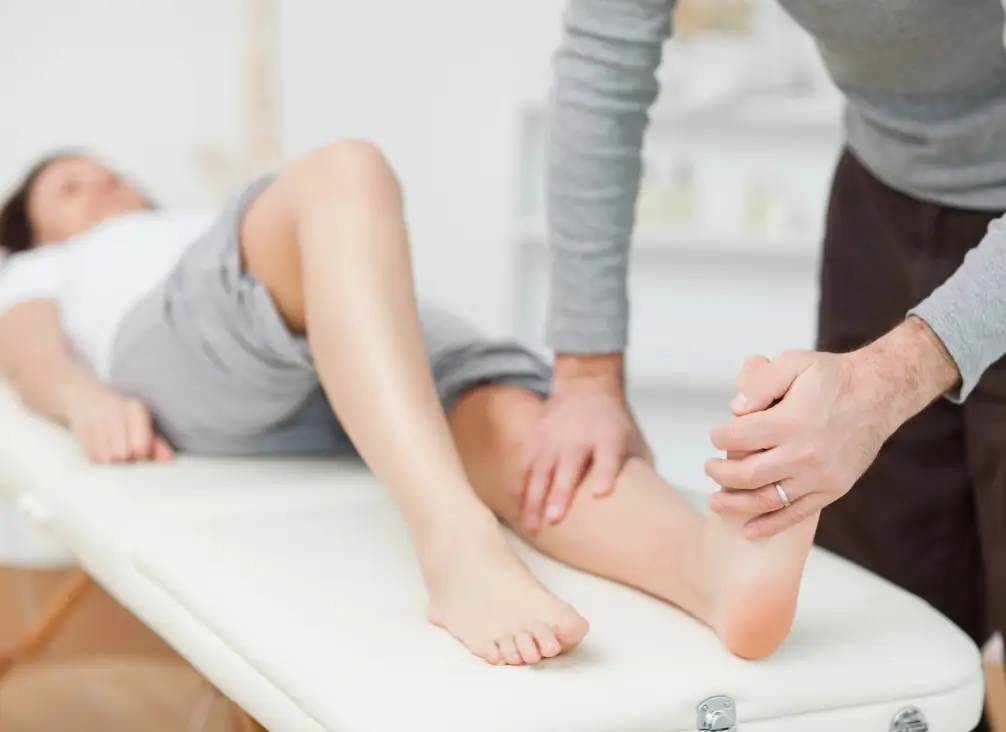 Podiatrist assessing child's heel for Sever's Disease in Brunswick